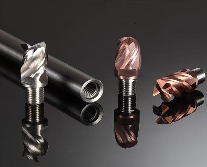 Exchangeable solid carbide head system — steel shank with interchangeable solid carbide heads in exploded view